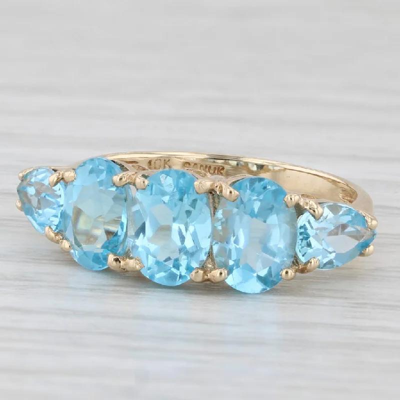 platinum engagement rings for women-Oval 3-Stone 4ctw Blue Topaz Ring 10k Yellow Gold Size 7