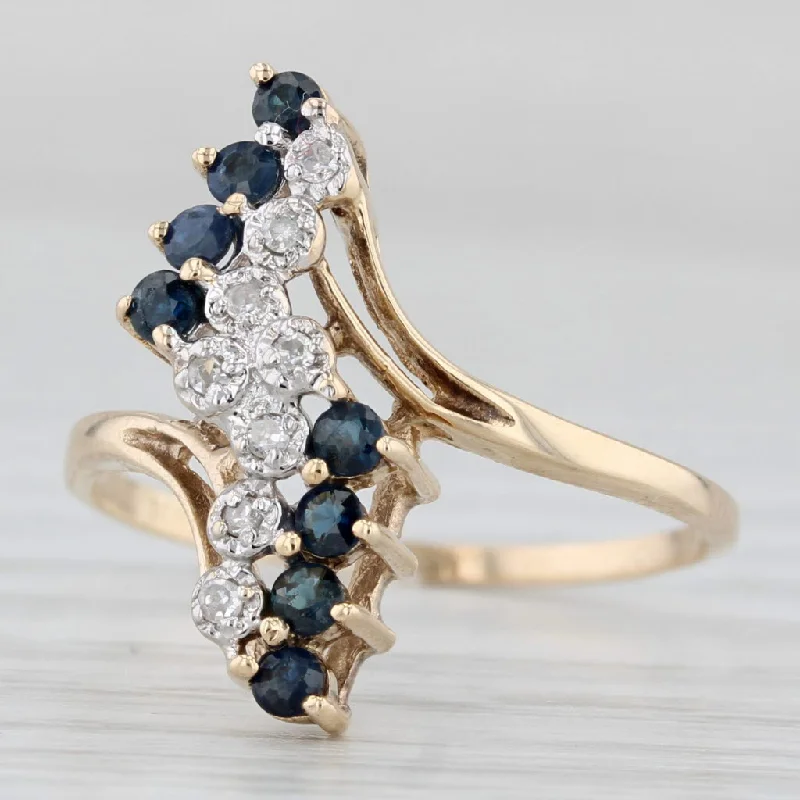 eco-friendly engagement rings for women-0.29ctw Blue Sapphire Diamond Bypass Ring 10k Yellow Gold Size 8