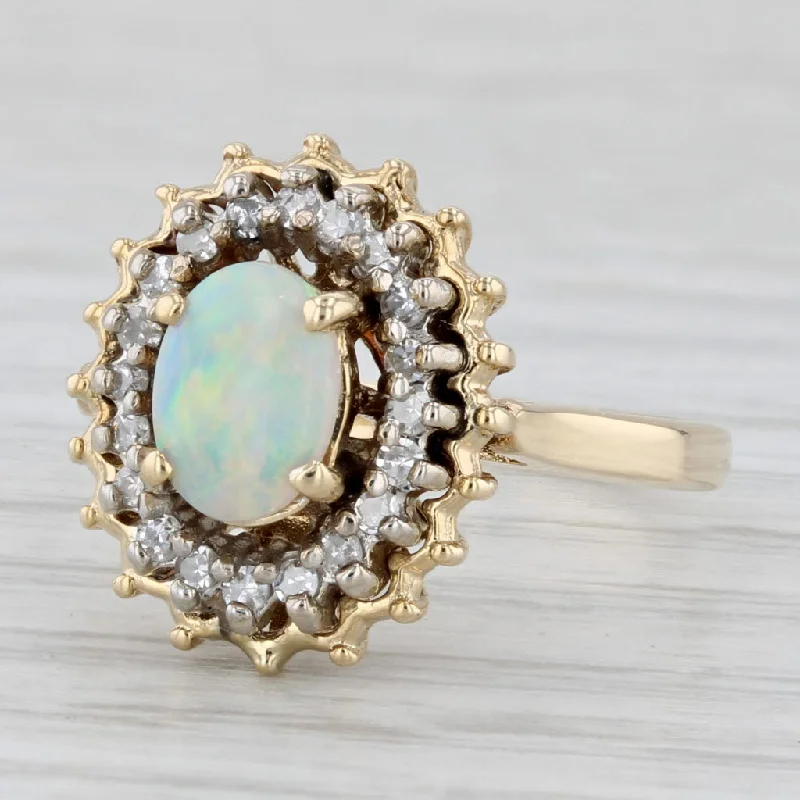 flower-shaped engagement rings for women-Oval Opal Cabochon Diamond Halo Ring 14k Yellow Gold Size 6.5