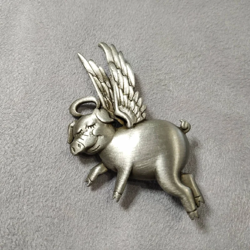 fashion-forward brooches for women-Flying pig brooch by JJ pewter